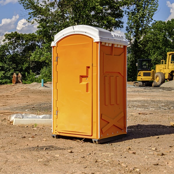 what is the cost difference between standard and deluxe portable restroom rentals in Valmy